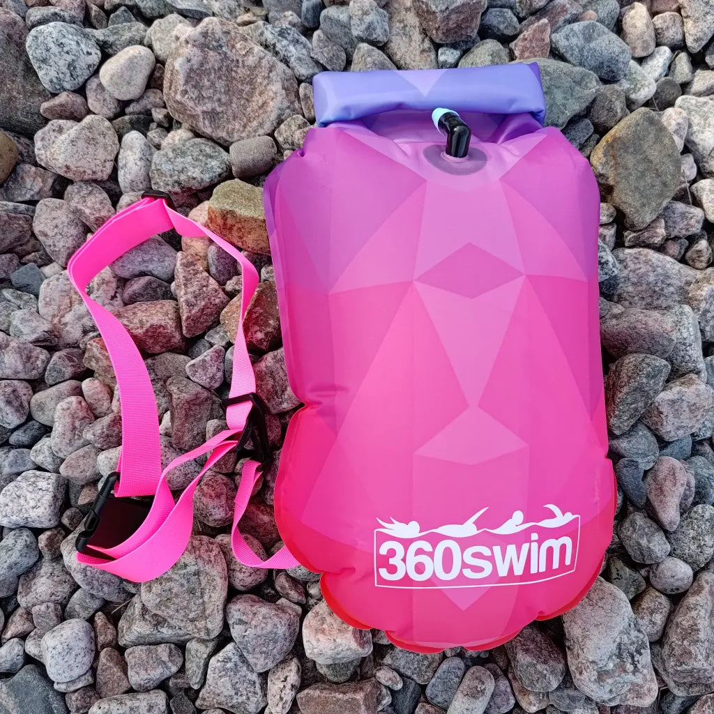 Electric Coral swim float - pink and blue drybag buoy for bold open water swimmers