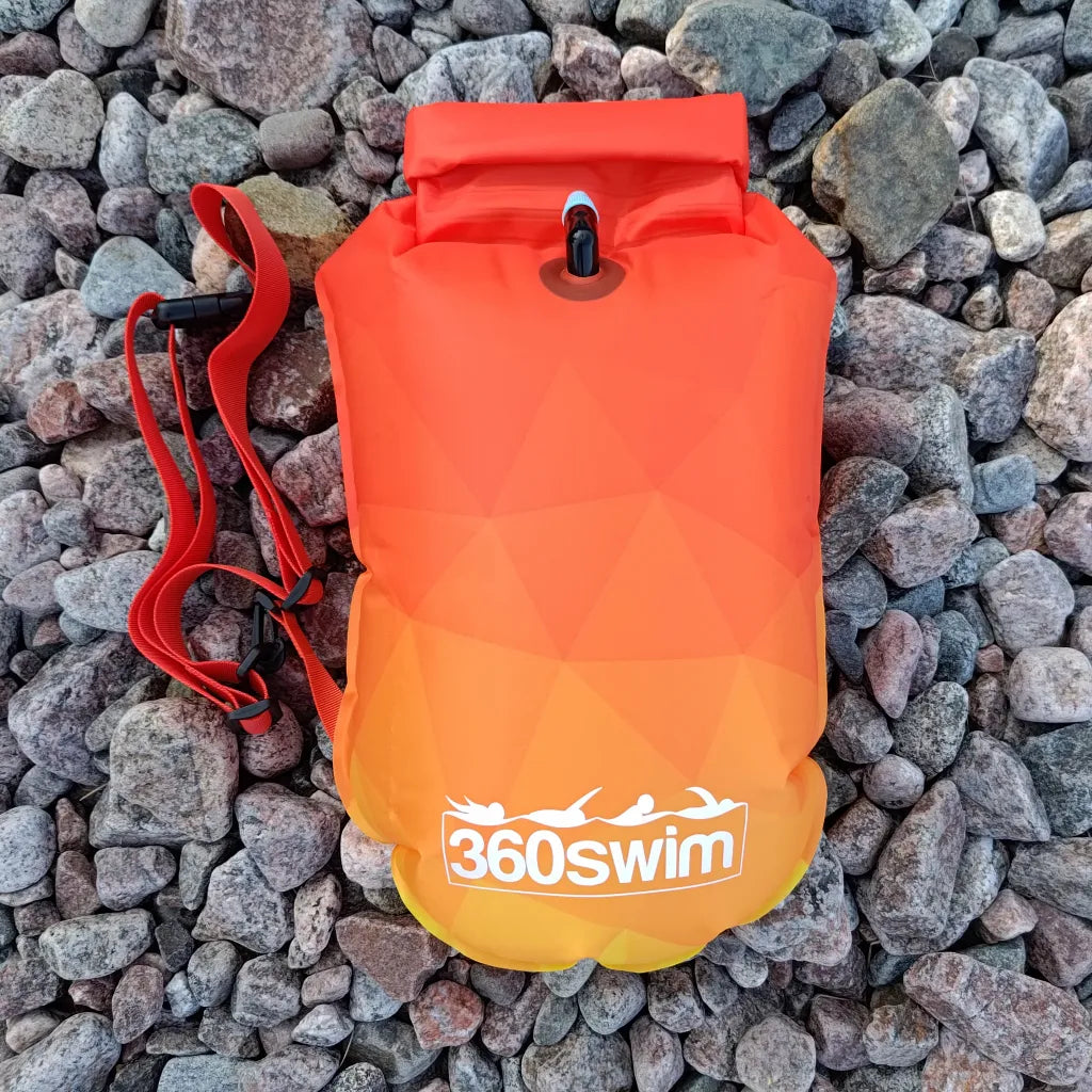 Front of orange gradient swim safety buoy - Sunflare design with drybag for open water