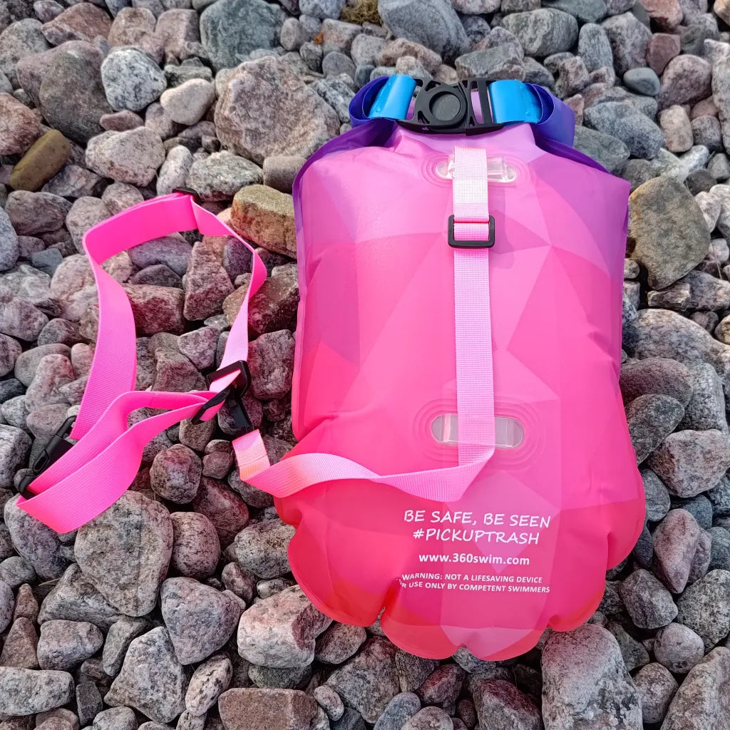 Back of Electric Coral open water swim buoy with waterproof storage