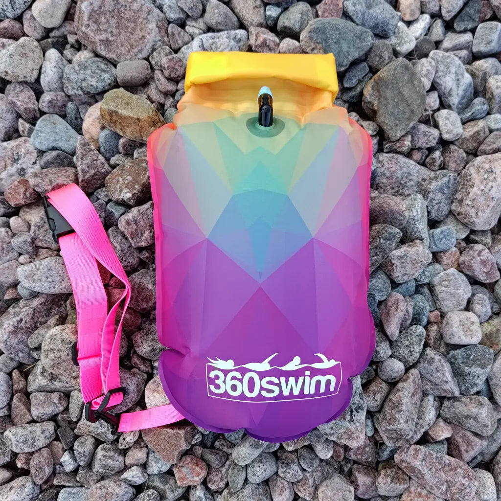 Front view of Twilight Bloom buoy - pink-purple waterproof swim float with drybag