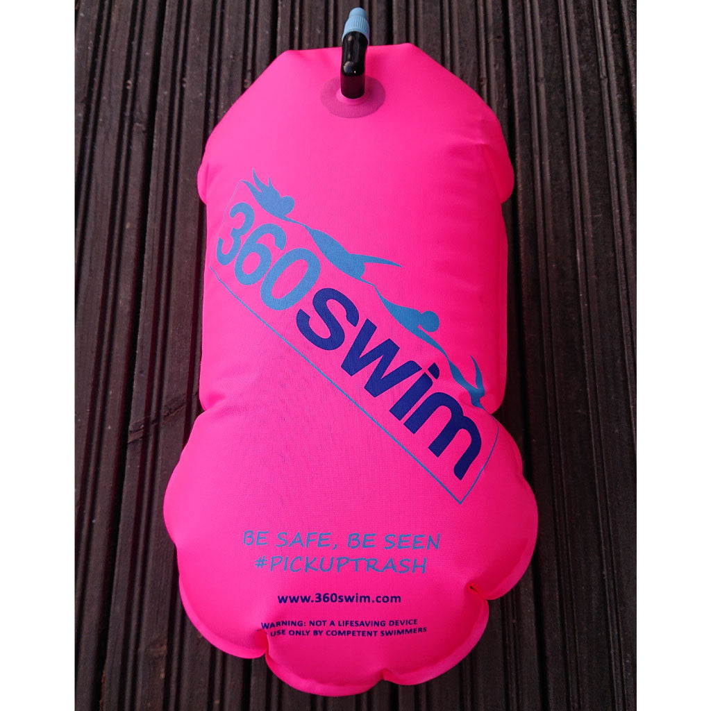 pink swimming buoy