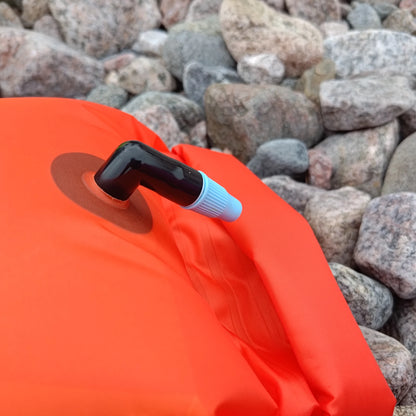 Close-up of inflation valve on orange sunflare 360swim Ultra Dazzle swim buoy