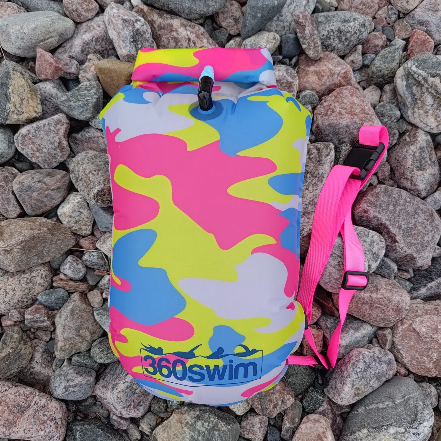 360swim Ultra Dazzle Drybag Buoy in Urban camouflage print with pink, blue, yellow and white pattern, with pink waist strap