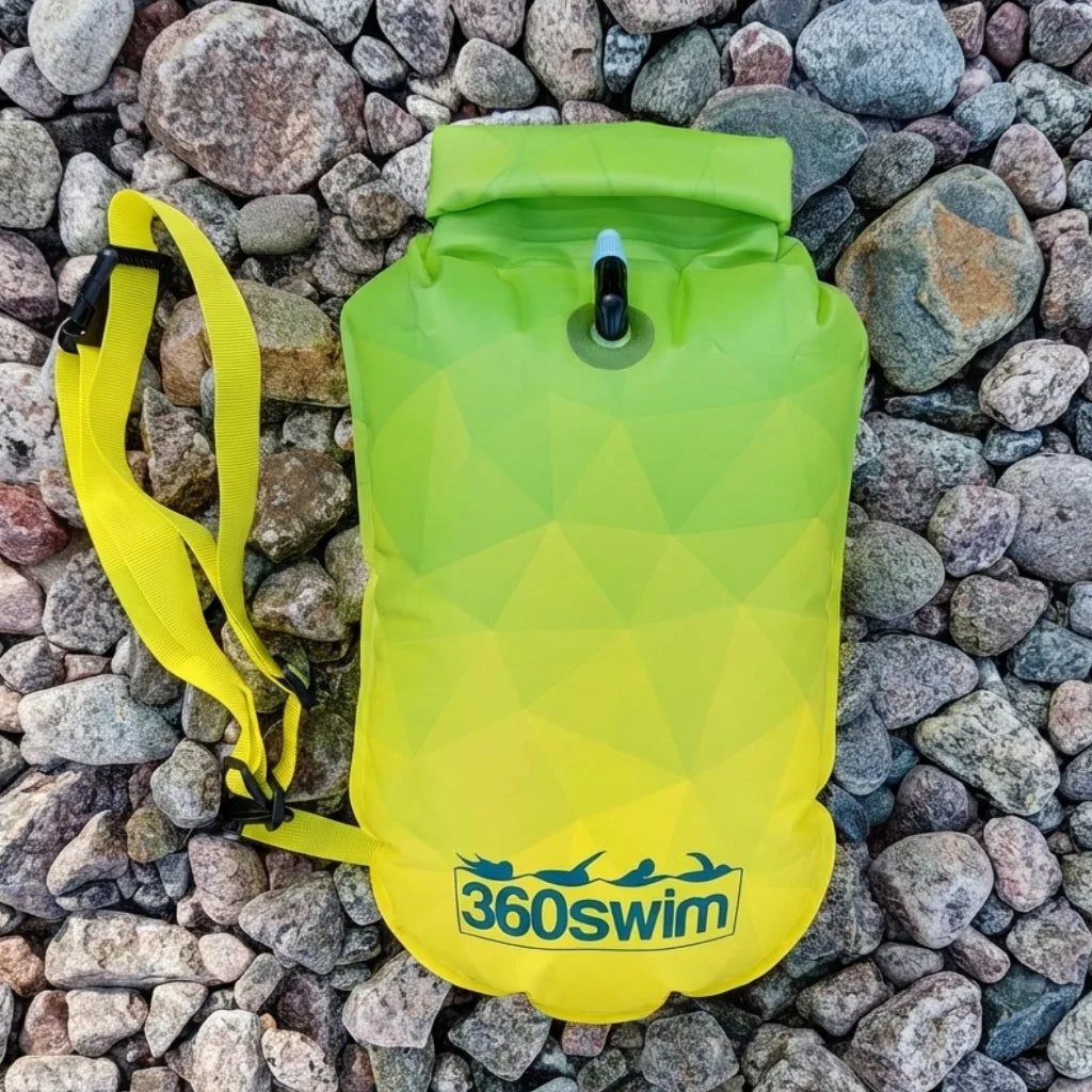 Ultra Dazzle Drybag Buoy in the Limeburst pattern for open water swimmers